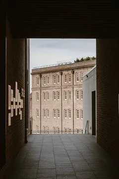 Vertical image of a view through of a building at the historic neighbourhoo.. Stockfoto's