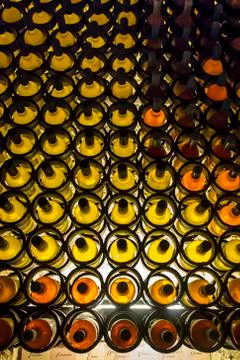 Vertical image of a wall mounted wine racks Stock Photos