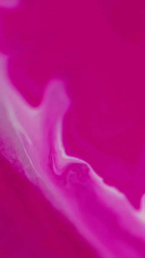 Vertical ink drop fluid spill pink white paint Video stock 283287384