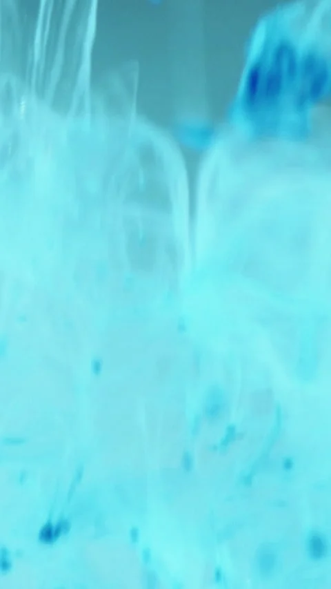 Vertical ink drop water blur mist blue droplets Stock Footage 312228324