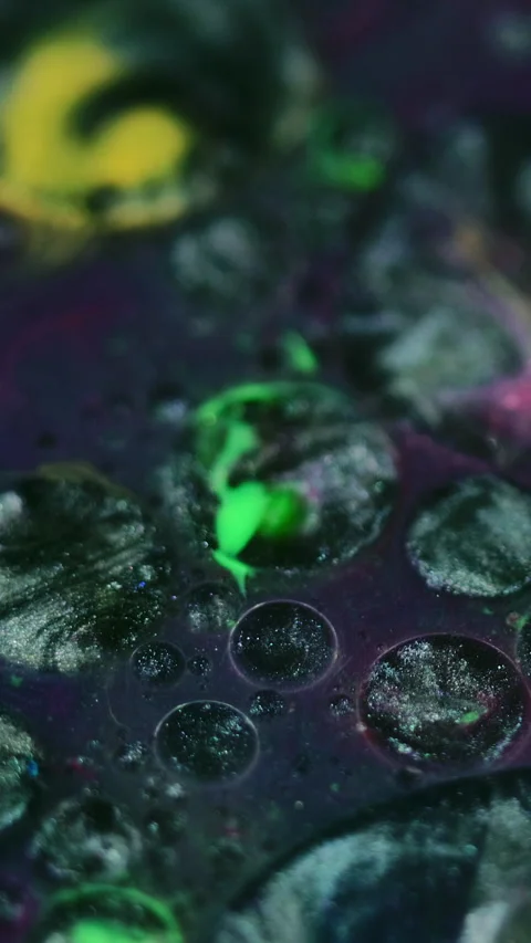 Vertical Ink mix background glitter dye metallic purple Video stock 274965174