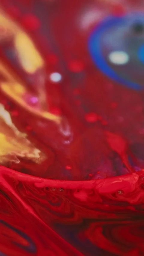 Vertical ink mix oil fluid blob red gold bubbles Stock Footage 284055166