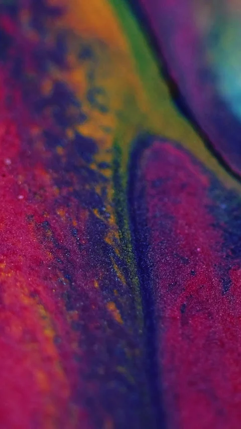 Vertical ink spill glitter fluid drip color mix Video stock 291572454