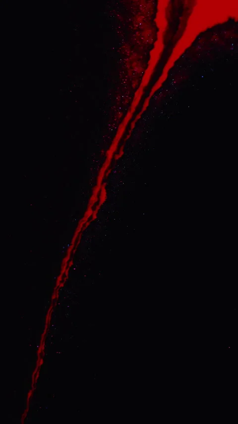 Vertical Ink stream glitter paint flow red fluid drip black Stock Footage 271050290
