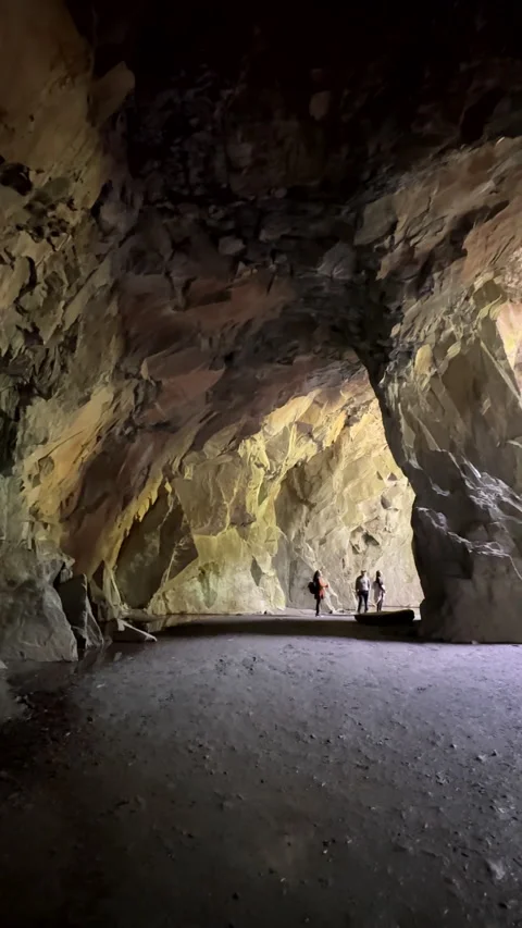 Vertical. Inside of stunning landmark, the Cathedral Cave in Lake District Stockbeeldmateriaal 308800836