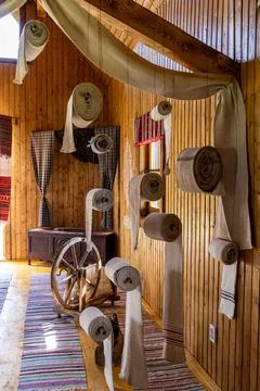 Vertical Interior View of Ethnic Fabric Rolls and Spinning Tools Exhibition Stock Photos
