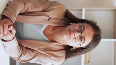 Vertical internet call boring conversation woman Stock Footage 248913326