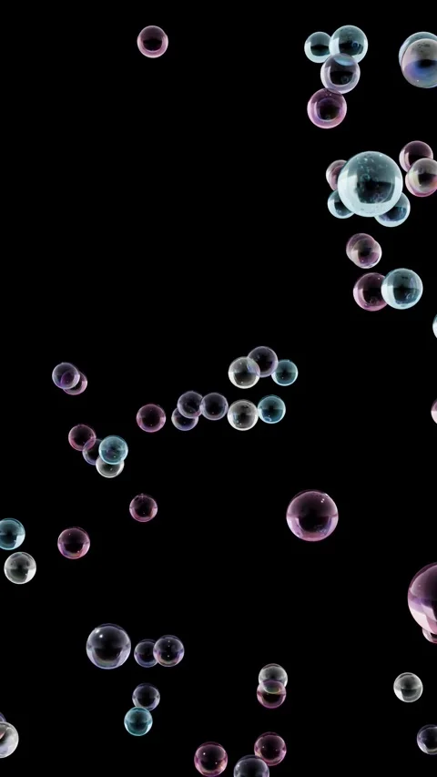 Vertical Iridescent Soap Bubbles Floating on Black Background Vidéo 334234964