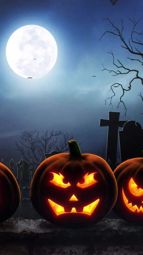 Vertical Jack O Lantern on a Graveyard Wall 4K Loop Stock Footage 275617218