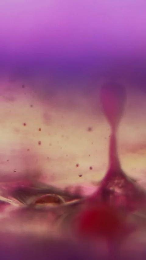 Vertical Jelly bubbles gel fluid drop ink water blue pink Stock Footage 274177724