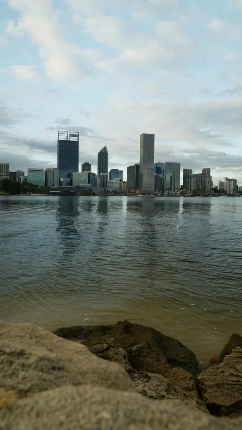 Vertical jetski passes Perth cityscape in Australia 6K Video stock 311575456