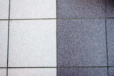 Vertical joint of two colors of tile Stock Photos