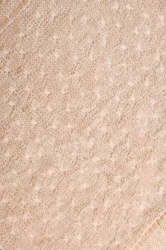 Vertical knitted light background with diagonal lines at the corners. 写真素材