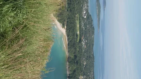 Vertical landscape summer view of the sea coast shore cliff with beautiful .. Stock Footage 240896836