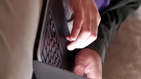 Vertical laptop research work job man hands home Stock Footage 255546998