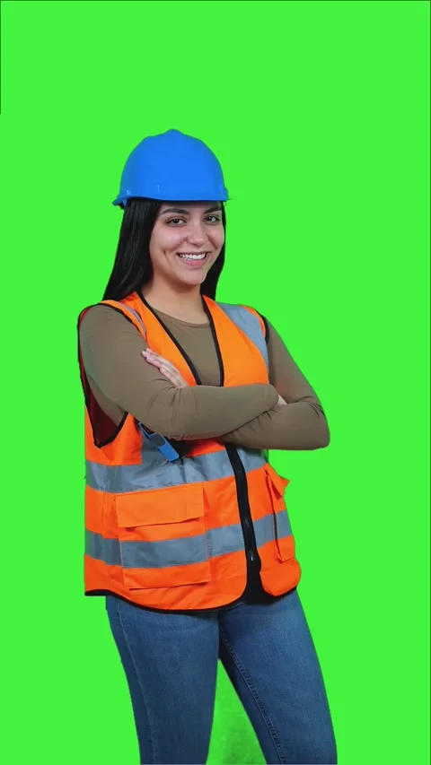 Vertical Latin Construction Worker Woman Posing on Green Screen Stock Footage 308743375