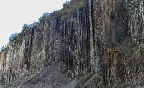 Vertical layers of rock in the mountains Stock Photos