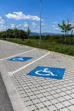 Vertical Layout of Handicap Accessible Parking Bays in Park Stock Photos