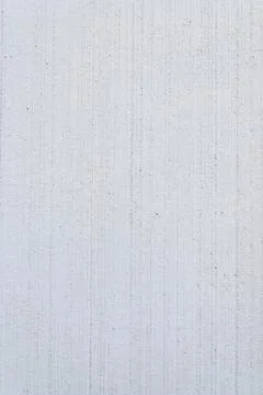 Vertical light plaster wall texture minimal facade background Stock Photos