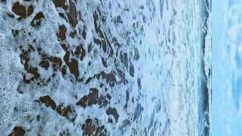 Vertical, Long Waves Falling on the Sea Shore Slow Motion, Waves and Ocean Blue  Stock Footage 277653031