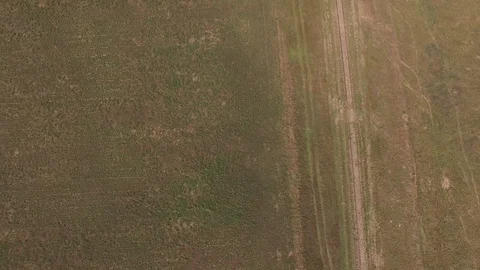 Vertical Look Down on Track Pan Up Stock Footage 98959943