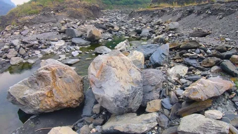 Vertical look up pane view in nature canyon valley with colorful boulders and ro Stock Footage 266502284
