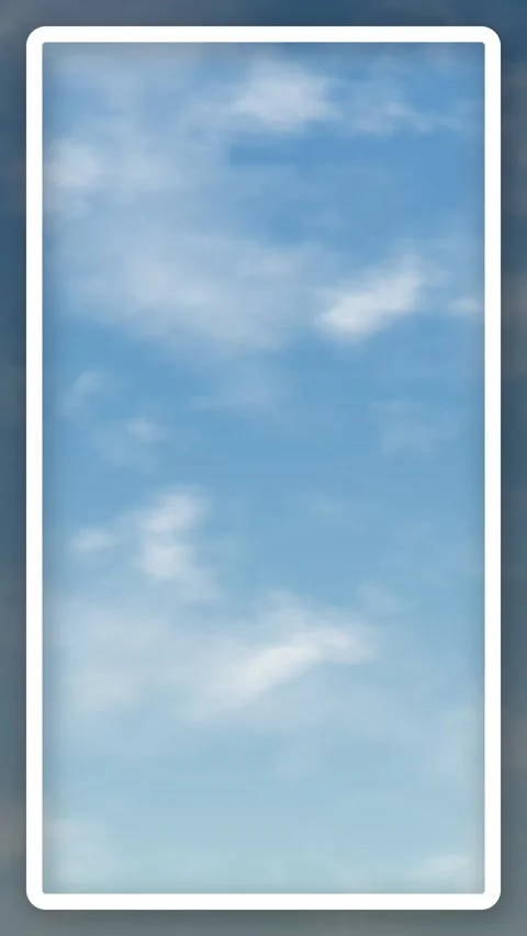 Vertical Loop of Soft White Clouds Drifting Through Blue Sky 動画素材 340968518