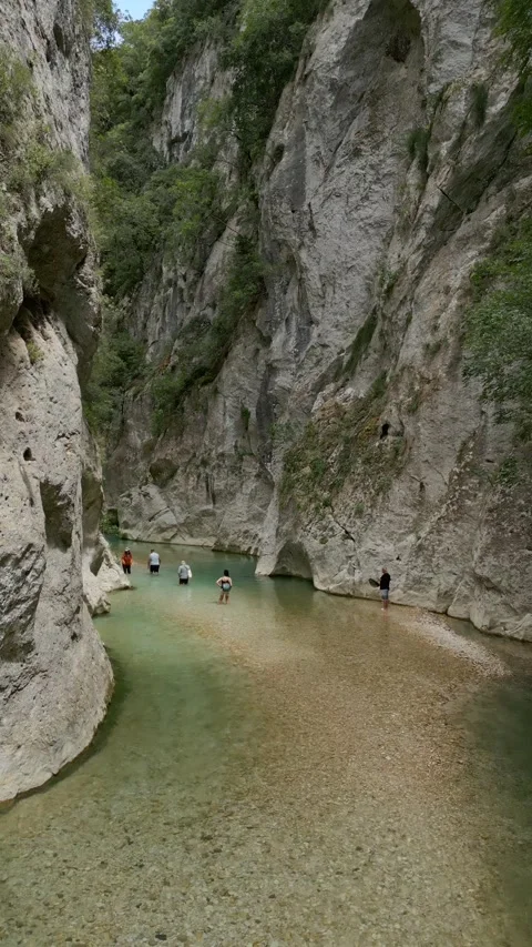 Vertical low altitude drone flight through the Acheron river gorge Stock-Footage 347446152