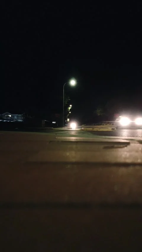 VERTICAL LOW ANGLE CAR NIGHT DRIVE Video stock 248583987