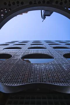 Vertical low angle modern architectural pattern against the sky. Dream Downtown, Stock Photos