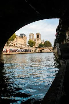 Vertical low-angle of a Seine river from a channel, Paris Police Prefecture buil Stock Photos