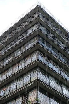 Vertical low angle shot of an angular modern building in Paris, France Photos