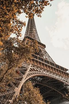 Vertical low angle shot of the Eiffel tower in Paris, France Stock Photos