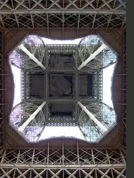 Vertical low angle shot of an Eiffel tower seen from below in Paris, France 스톡 사진