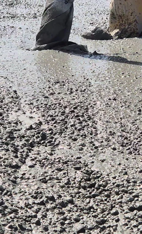 Vertical Low Angle View of Vibrating Fresh Concrete Slab Stock-Footage 334993882
