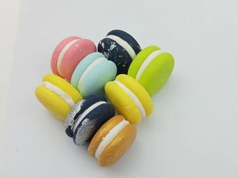 Vertical macarons assortment on white background Stock Photos