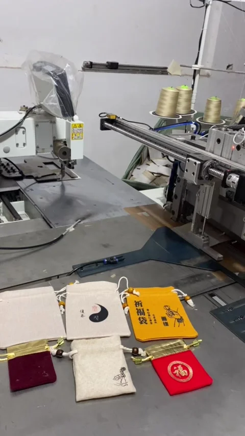 Vertical Machine Producing Chinese Blessing Bags with Text Meaning Good Fort Stock Footage 334729850