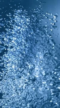 Vertical Macro Close Up Studio Shot of Transparent Blue Gas Bubbles under Wat Ilustração Stock