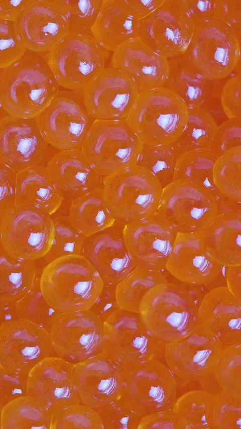 Vertical Macro Rotating Video of Glistening Red Caviar Vídeo Stock 334078635