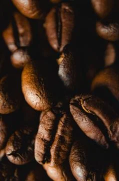 Vertical Macro Selective Focus Coffee Beans: Detailed Texture Optical Depth.. Stock Photos
