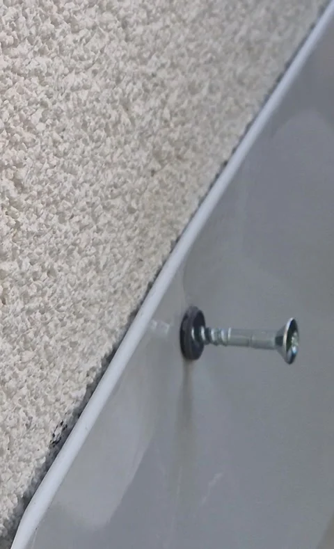 Vertical Macro Shot Driving Screw In Roof Flashing 9 16 Stock-Footage 336631292