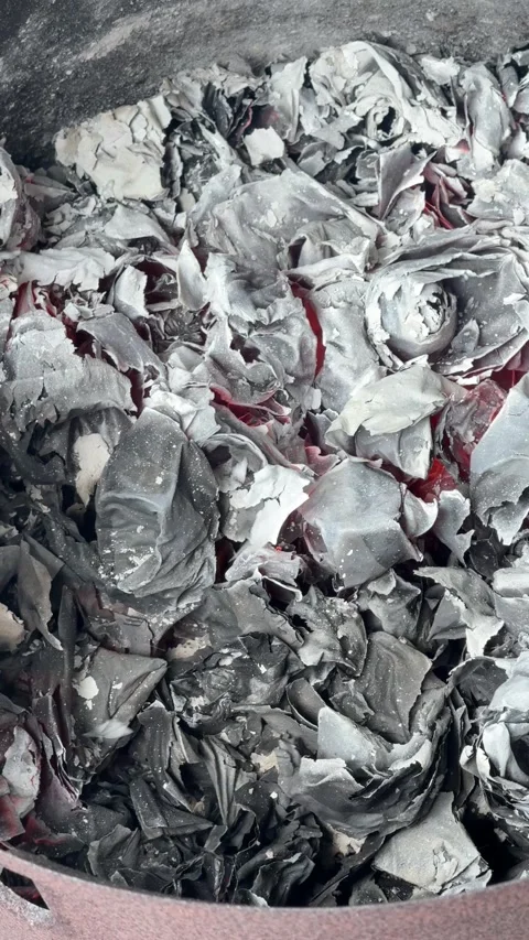 Vertical Macro Shot Of Glowing Embers Under Burnt Paper Ashes Stock Footage 343725708