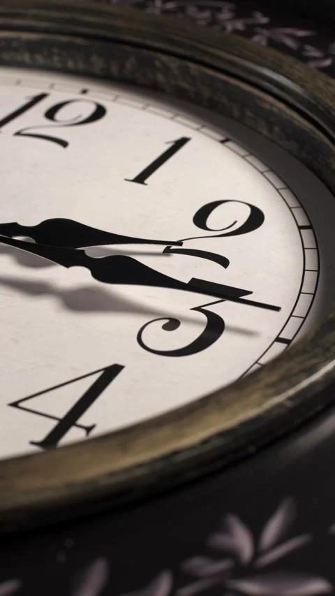 Vertical macro static timelapse shot of vintage analog clock hands spinning Stock Footage 336090188