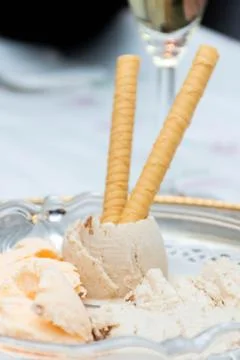 Vertical macro view of natural vanilla ice cream and stratachella with wafers Stock Photos