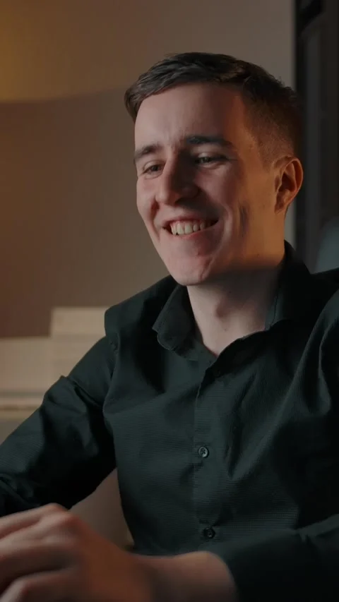 Vertical of The man communicates with online call at a conference on his laptop Stock Footage 276923186