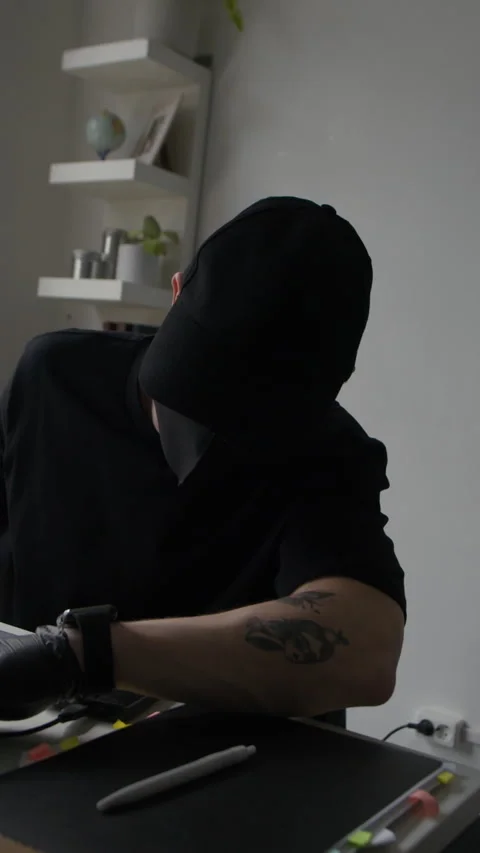 Vertical of Man Hacking Office Laptop Using Hard Drive while Stealing Data Stock Footage 313557001