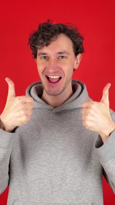 Vertical man showing in front thumb up hand sign like gesture Stockbeeldmateriaal 304760974