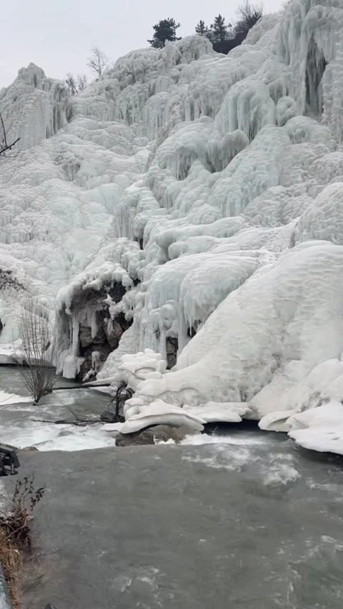Vertical Massive Frozen Ice Waterfall In Winter Stock-Footage 334016684