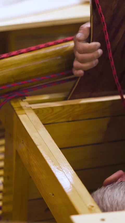 Vertical of Master working with new wooden homemade boat in workshop Stock Footage 305516014