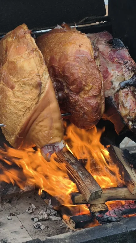 Vertical Meat Roasting Over Open Wood Fire Rustic BBQ Cooking 4K Stock-Footage 332162791
